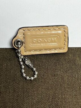 Coach Tan 1.5” Leather Hangtag